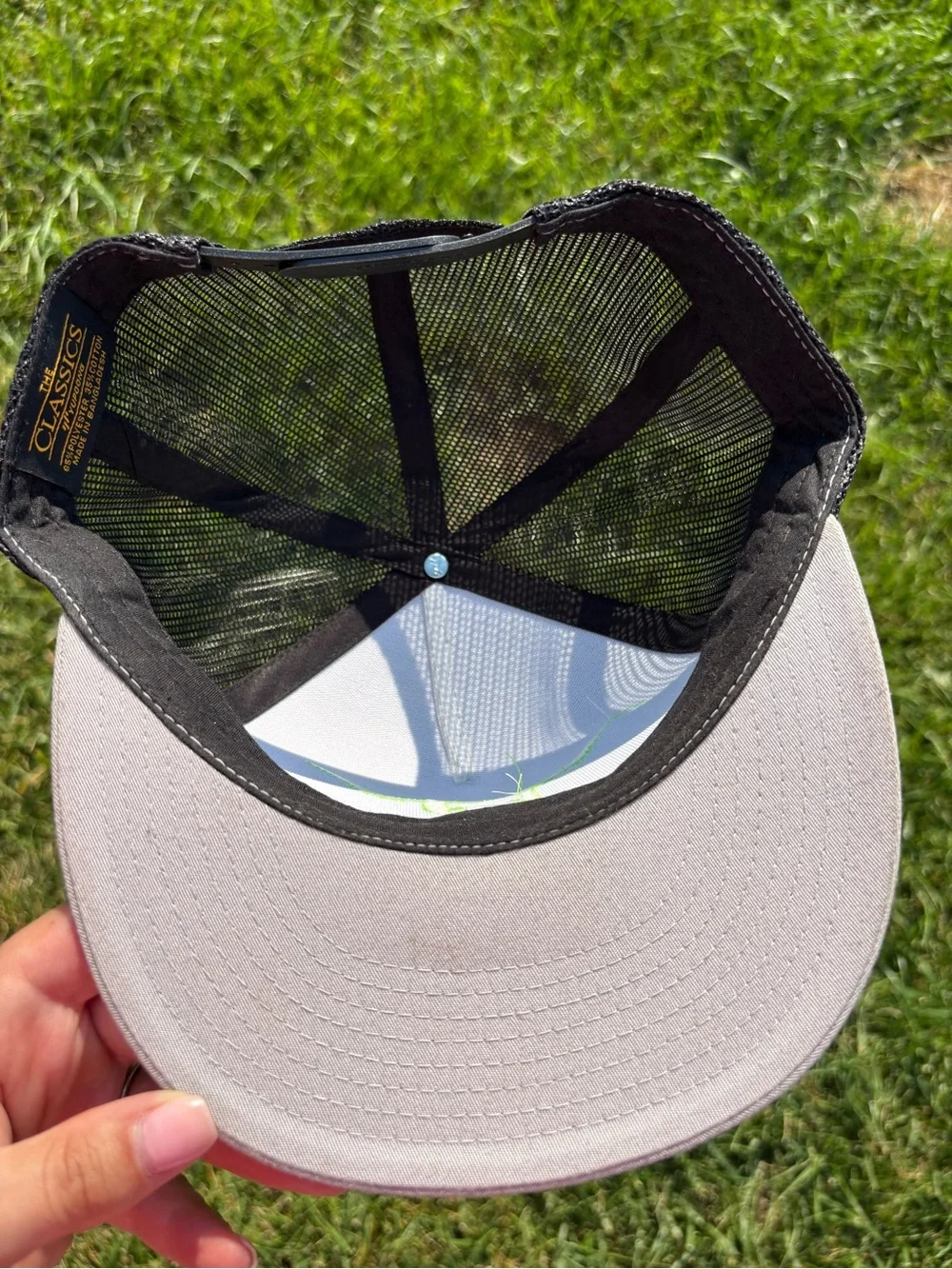 West River light grey and green hat